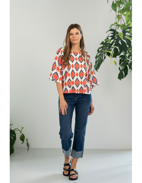Vaquero cropped con bajo vuelto